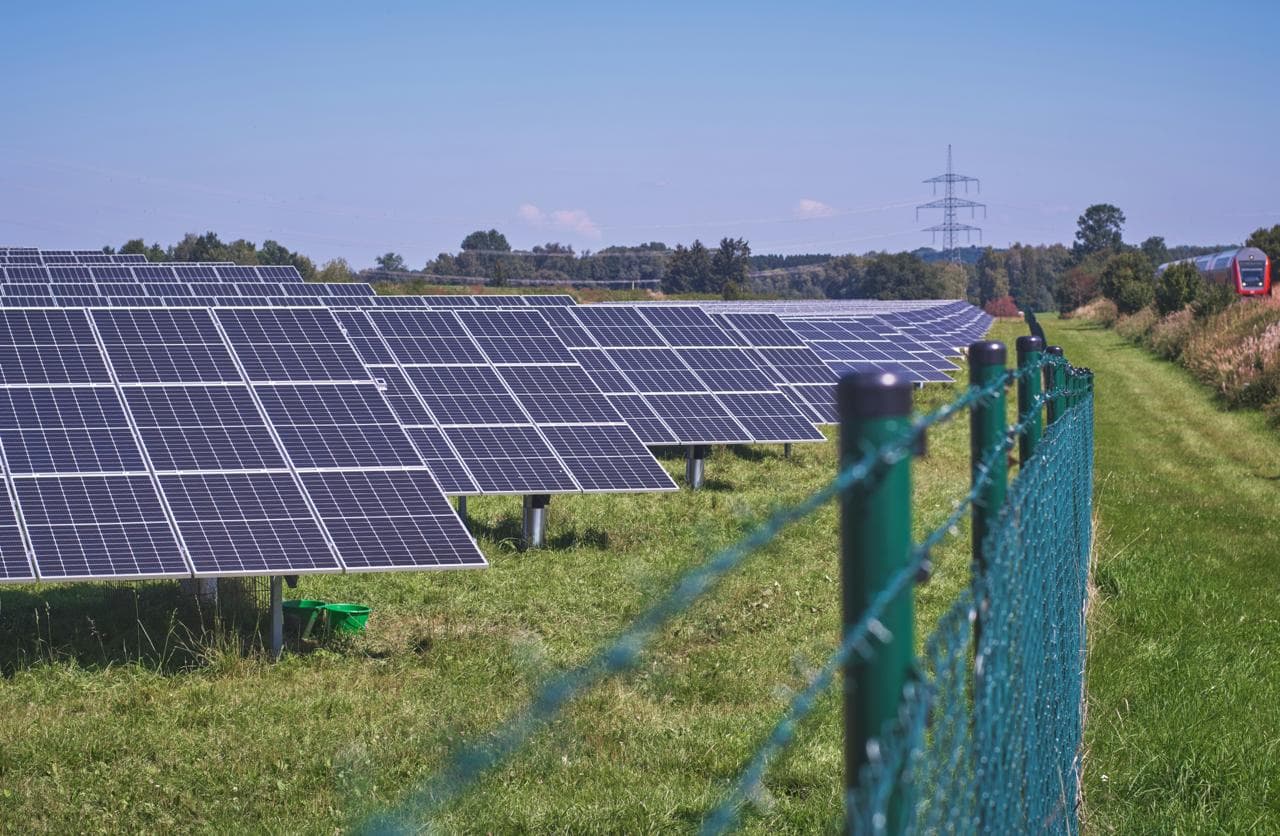 Solar panels across an open field